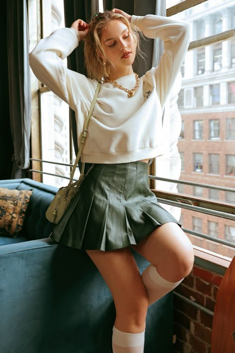 FAUX LEATHER PLEATED MINI SKIRT Brand: Blu Pepper Style: B3FS1001 Fabric: 100% polyester Details: - EXPOSED METAIL TOOTH ZIPPER - PLEATED - MINI SKIRT - SOLID - LINED - SHELL: 100%POLYESTER COATING: 100%POLYURETHANE LINING: 100%POLYESTER Green Skater Skirt Outfit, Teen Skirt Outfits, Outfits With Green Skirt, Short Green Skirt Outfit, Flowy Short Skirt Outfit, Mini Skirt Photoshoot, Knee Length Skirt Outfits, Green Leather Skirt Outfit, Green Skirt Outfit Ideas