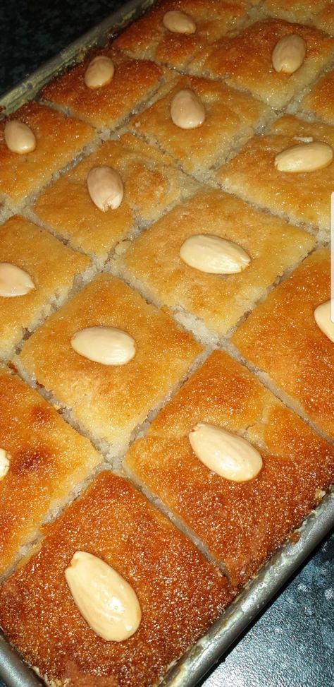 Namoura (Lebanese semolina cake) | Semolina cake, Lebanese desserts recipes, Party food dessert Recipes Without Flour, Namoura Recipe, Lebanese Desserts Recipes, Basbousa Recipe, Arabisk Mad, Lebanese Desserts, Arabic Desserts, Almond Meal Cookies, Arabic Dessert