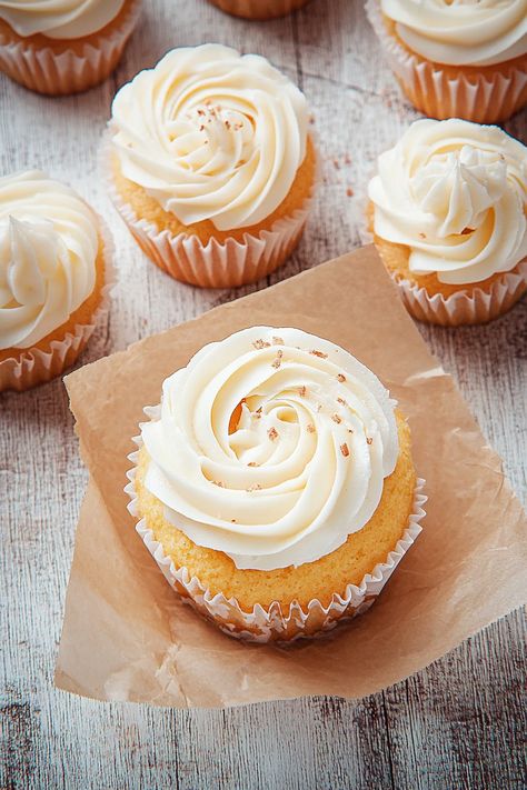 These fluffy vanilla cupcakes are so light and airy! Top them with the perfect vanilla frosting for an irresistible dessert. Vanilla Cupcakes From Scratch, Fluffy Vanilla Cupcake Recipe, Best Vanilla Cupcakes, Cupcake Desserts, Fluffy Vanilla Cupcakes, Vanilla Cupcakes Recipe, Cupcake Vanilla, Trendy Recipes, Moist Vanilla Cupcakes