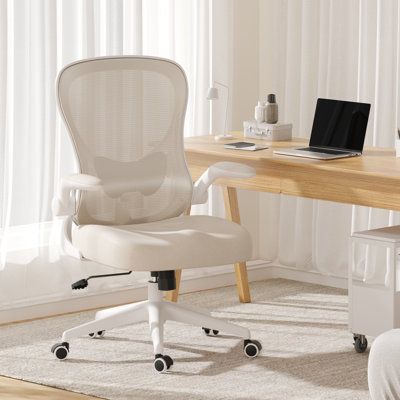 This chair is ideal for any home or office. Crafted from good quality material, the ergonomic design brings a sleek look with ample durability and support for long-term use. The generously padded back and seat provide extra comfort, and the durable base provides additional stability, while the easy-rolling casters allow smooth rolling and swivel movement in this deluxe seating for your office or study space. It is ideal for office desks or computer desks and adjustable height allows for differen Beige Desks, White Desk Chair, Desk Chair Comfy, Rolling Office Chair, Cute Desk Chair, Rolling Chair, Study Chair, Grey Desk, Adjustable Height Standing Desk