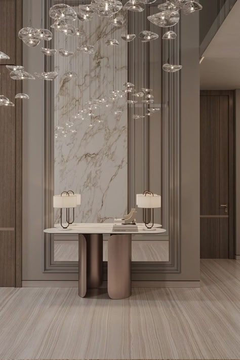 Upgrade your home entrance decor with these luxurious lighting fixtures for a stylish touch. Console Design Modern, Hotel Corridor Design, Big Villa, New Classic Interior, Dubai Bling, Gray Interior Design, Dining Lamp, Damac Hills, Kitchen Showrooms