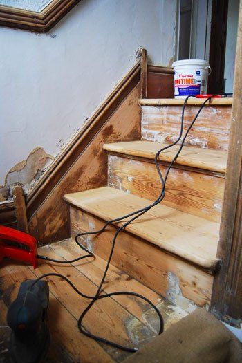 One Year Later: What Our Painted & Stained Staircase Looks Like Now Painting Wooden Stairs, Stained Staircase, Stairs Nook, Stairs Skirting, Victorian Stairs, Painted Staircase, Under Stairs Nook, Stair Nook, Victorian Hallway