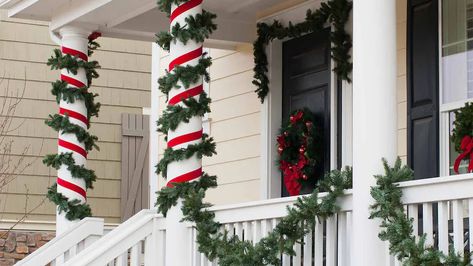 How To Decorate Front Porch Pillars For Christmas, How To Decorate Front Porch Posts For Christmas, Christmas Pillars Decorating Ideas, Christmas Decor Columns Inside, How To Decorate Front Porch Poles For Christmas, Outside Pillar Christmas Decor, Christmas Porch With Columns, Decorate Pillars For Christmas, Column Christmas Decor Porch Ideas