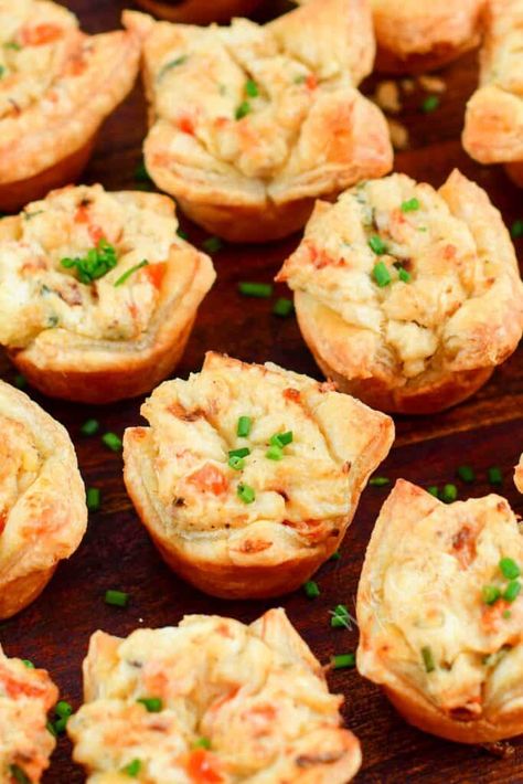 These homemade Crab Puffs are absolutely addicting! Each buttery puff pastry cup is filled with an unbelievably delicious creamy crab mixture that's made with lump crab meat, cream cheese, parmesan cheese, veggies, and SO much more. Just one will not be enough! Crab Appetizers, Crab Puffs, Crab Appetizer, Will Cook For Smiles, Lump Crab Meat, Puff Pastry Appetizers, Pastry Appetizer, Crab Dishes, Creamy Crab