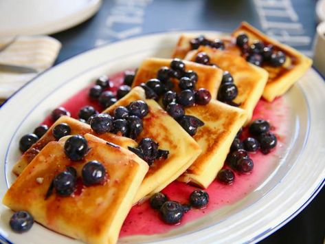 Get Blueberry Blintzes Recipe from Food Network Blueberry Blintzes, Blintzes Recipe, Girl Meets Farm, Easter Brunch Food, Best Comfort Food, Blueberry Recipes, Cheese Flavor, Pancakes And Waffles, Easter Brunch