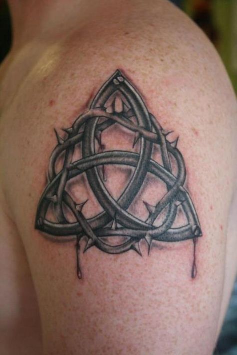 11 Irish Trinity Knot Tattoo Celtic Trinity Knot Tattoo, Tattoo With Names, Trinity Knot Tattoo, Cross Tattoo Meaning, Celtic Tattoos For Men, Shoulder Armor Tattoo, Trinity Tattoo, Holy Trinity Tattoo, Small Wave Tattoo