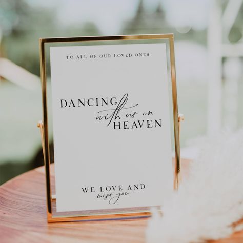 Remember your loved ones in a special way with our "Dancing With Us in Heaven" sign. This loving memory table sign is perfect for weddings, allowing you to honor those who are no longer with us but forever dancing in heaven. Our editable sign features a heartfelt message that will bring comfort and warmth to your celebration. Light a candle and let their presence be felt as you commemorate them with this beautiful in memory sign. Include this touching heaven wedding sign in your wedding signage Tribute To Lost Loved Ones At Wedding, Including Lost Loved Ones In Wedding, Celebrating From Heaven Wedding Sign, In Loving Memory For Wedding, Sign For Loved Ones In Heaven Wedding, Wedding Signage Bible Verse, Memory Wall For Wedding, Loved Ones Sign Wedding, Wedding Signs For Those Who Have Passed