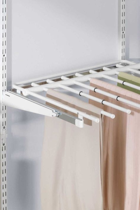 Preserve pant pleats. - WomansDay.com Closet Organization Pants, Small Closet Diy, Closet Diy Ideas, Rubbermaid Closet Organizer, Rubbermaid Closet, Pants Organizer, Easy Closet Organization, Easy Closet, Organiser Son Dressing