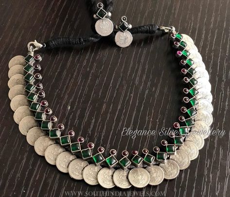 Finely crafted pure silver coin necklace studded with bold emerald and rubies. For inquiries, please contact the seller below. Seller Name : Elegance Silver Jewellery Facebook : http://www.facebook.com/elegance.kalaivani https://www.instagram.com/elegance.ks/ Email : orderatelegance@gmail.com Related PostsThread Necklace With Coin MotifsBeautiful Silver Coin NecklaceGold Plated Pure Silver Coin NecklaceAntique Gold Plated Attigai NecklaceOxidized Silver Neck... Silver Coin Necklace, Silver Jewelry Diy, German Silver Jewelry, Antique Silver Jewelry, Silver Jewelry Box, Silver Jewellery Indian, Fine Silver Jewelry, Jewelry Bracelets Silver, Silver Jewellery Sets