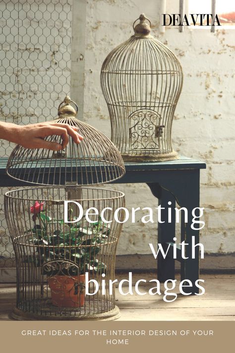 Decorating with birdcages provides you a unique opportunity to add something beautiful and unexpected to your home decor. A birdcage, especially if it looks like a real work of art, can be a great way to decorate a home interior. Many people love cages with live birds as they give the house a special charm, but along with the charm come quite many duties, cleaning, etc. Luckily, a cage can be used in many different ways either empty or filled with a variety of items. Birdcages Decor Ideas Display, How To Decorate With Bird Cages, Bird Cage Table Centerpiece, Vintage Birdcage Decor Ideas, Birdcage Repurpose Ideas, Wire Bird Cage Decor Ideas, Decorating A Bird Cage Ideas, Old Bird Cage Ideas Decor, Vintage Bird Cage Decor Ideas