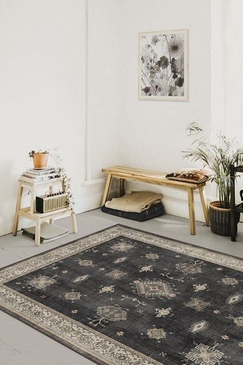 Wondering what color rug goes with grey floors? The truth is - lots of them. Grey floors are neutral and look good with most colors and materials. Dep... | Contrast Them with a Darker Color Dark Wood Rug, Wood Rug, Grey Hardwood, Grey Floor, Grey Wood Floors, Ruggable Rug, Up House, Grey Flooring, Rug Stain