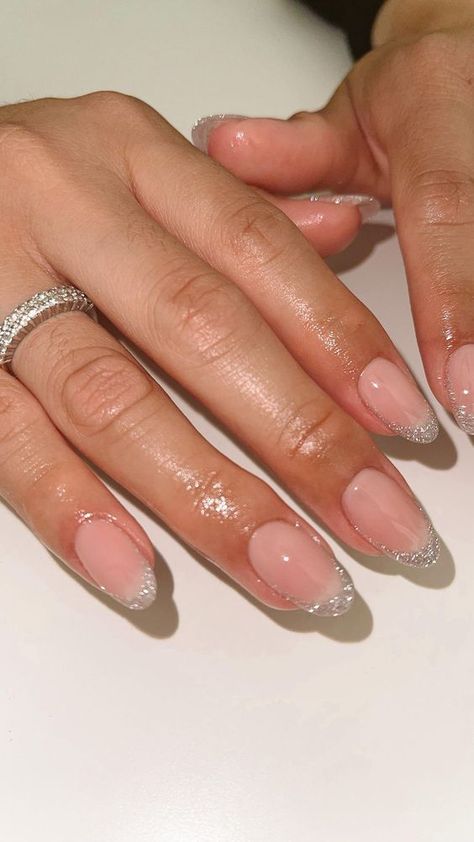 Elevate your nail game with these stunning glitter French tip nails! Perfectly designed for a chic and stylish look, these short round acrylic nails add a touch of sparkle to any outfit. Ideal for those who love a trendy yet elegant manicure. 

#TrendingFrenchTipNailsShort #GlitterFrenchTipsRound #CuteShortRoundNailDesigns #FrenchNailsWithGlitterTips #ShortReflectiveNails Trending French Tip Nails Short, Gel Polish French Manicure Short Nails, Glitter French Tips Round, Short Reflective Nails, Trendy Round Nails Short, Short Round Gel X Nails, Cute Short Round Nail Designs, Short Round Gel Nail Designs, Short Nails Ideas Oval