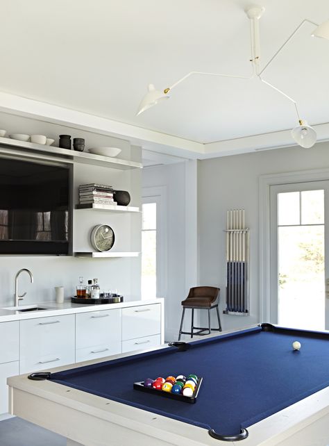 Our gorgeous game room. Love the modern features and beautiful navy and white pool table. Custom designs in our Quogue, NY project. Design collaboration with Tina Ramchandani + Winter McDermott. Photo by Jacob Snavely. White Pool Table, Winter Mcdermott, Basement Rec Room Ideas, Rec Room Ideas, Basement Rec Room, Modern Game Room, Snooker Room, White Pool, Pool Table Room