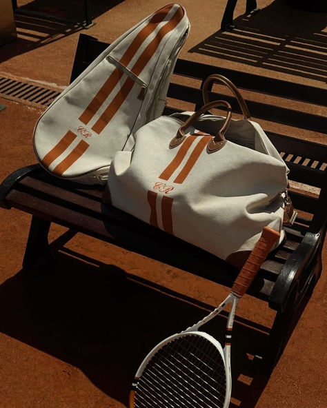 Art meets practicality with this collection of Italian-made personalised bags. From embroidered tennis racket cases to monogrammed weekend bags, they are handcrafted in Italy and customised with initials or name.  This colourful tennis racket case is exquisitely crafted from premium cotton with striped detail. Featuring an adjustable fine leather strap, it is complete with detailed personalisation for a thoughtful gift.  Tennis aesthetic nailed this summer for tennis core. Tennis Wimbledon, Linen Cargo Pants, Monogrammed Duffle Bag, Claire Rose, Striped Bag, Huntington Park, Bedroom Suites, Wedding Gift Guide, My Style Bags