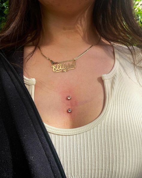 Magnificent Dermal Piercing Ideas That You Can Embellish On Your Body - Psycho Tats Dermal Body Piercings, Body Dermal Piercing, Back Surface Piercing, Double Back Dermal Piercing, Double Dermal Piercing Face, Tear Drop Piercing On Face, Back Dermal Piercing Black Women, Surface Piercing Chest, Arm Piercing