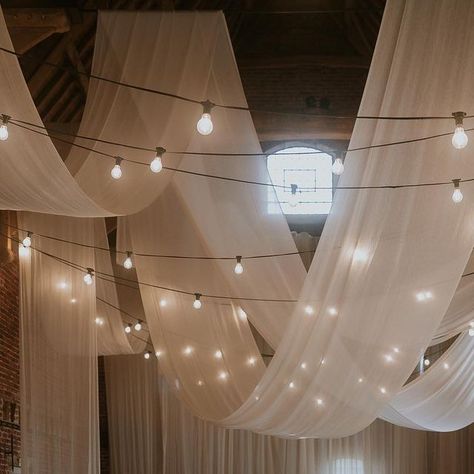 Aimee - WEDDING STYLING, COORDINATION & PROP HIRE on Instagram: "NO WORDS // because when images are as beautiful as this they’re sometimes not needed 🤍 Event Planning and Design // @wildeandvine Photography // @loveinbloom_weddings Venue // @godwickhall @godwickweddings Signage // @bewilderly Table Stationery // @rosewood_co Frames // @the.blissful.bride Textile Design + Fabric Installation // @miasylviaa & team @abbyspringham @allymfoster Floral Design // @wildeandvine Cake // @edge_by_imo Whimsical Ceiling Decor Wedding, Hanging Ceiling Decor Wedding, Wedding Decor Lights Indoor, Ceiling Decoration Wedding, Fabric Installation Wedding, Balloons At Wedding, Wedding Drapery Ideas Ceilings, Tent Wedding Lighting, Wedding Decor Ceiling