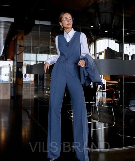 This pantsuit exudes elegance and sophistication, tailored for those who appreciate quality.  This three-piece pantsuit comprises an elegant jacket, stylish trousers, and a buttons vest.  Each element of this ensemble accentuates your individuality and creates a unique style statement. Details: -Blazer and Vest lined  -Double Breasted Blazer  -Fabric - suit crepe - premium diagonal -Jacket back length -74 cm/29 inch -Sleeve length -60 cm/23,6 inch -Vest back length -43 cm/17 inch  -Pants - side Unique Women Suits, Women’s Suit And Tie, Women’s Pantsuit, Grad Suits For Women, Pantsuit Graduation, Women Three Piece Suit, Unique Suits Women, Formal Suits For Women Classy, Vest With Wide Leg Pants