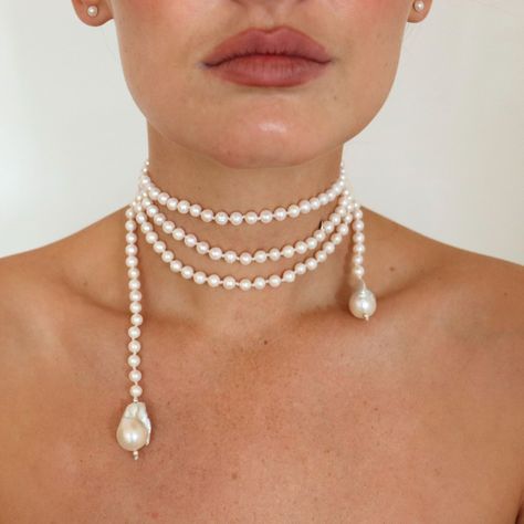 White fresh water pearls sit on a 170cm cotton thread piece, finished with a baroque pearl at each end. This pearl necklace is fabulously unique and versatile. See the images for the many ways to wear this necklace. Wrap it, tie it, loop it, wear it! A timeless and fabulous pearl necklace. Avoid perfume and hairspray. Store in a safe place to avoid scratching. Braided Pearl Necklace, Bohemian Pearl Necklace, Pearl Tie Necklace, Wedding Statement Necklace, Wedding Dress With Choker Necklace, Pearl And Aquamarine Necklace, Stacked Pearl Necklace, Cool Pearl Necklace, European Jewelry Trends