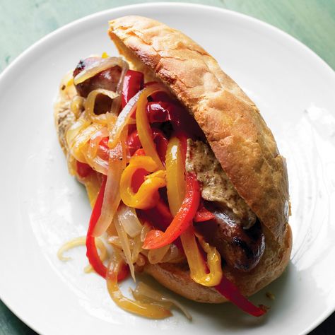 Delicious, satisfying, and under 400 calories -- this dinner has it all. Sausage On A Bun, Sausage Sandwich Recipes, Sandwich Vegetarian, Hot Sandwich Recipes, On A Bun, Sausage Sandwiches, Martha Stewart Recipes, Cheese Steak Sandwich, Sub Sandwiches