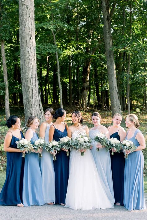 Bride with her Bridemaids dressed in different shades of blue Saphire Dresses Bridesmaid, Brides Made Dresses Blue, Blue Dresses For Bridesmaid, Blue Themed Wedding Dress, Bridesmaid Dresses Different Blues, Bridesmaid With Different Dresses, Bestmaids Dresses, Silk Bridesmaid Dress Blue, Light And Dark Blue Bridesmaid Dresses