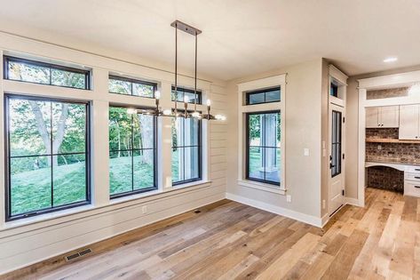 Custom-designed Pella® Impervia® windows visually connect the dining room and the kitchen in this modern farmhouse. Crafted of our highly durable fiberglass, these windows bring in abundant natural light—and natural beauty. Black Window Trims, Black Window Frames, Pella Windows, Dining Room Windows, Farmhouse Windows, Interior Windows, White Windows, Black Windows, Farmhouse Interior