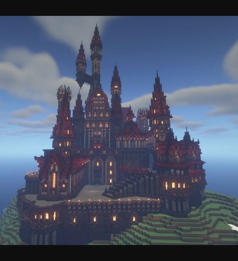 Evil Castle with red roofs and a stone base Minecraft Mountain Castle Blueprints, Dracula Castle Minecraft, Castle Exterior Minecraft, Castle Inspo Minecraft, Minecraft Gothic Castle Blueprints, Dark Mansion Minecraft, Minecraft Haunted Castle, Nether Houses Minecraft, Gothic Manor Minecraft