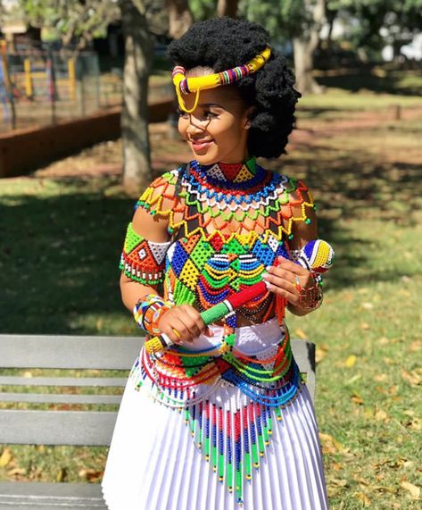 Noxy Zondi In Beautiful White Zulu Skirt and Colourful Beaded Accessories | Clipkulture | Clipkulture Zulu Bride, Zulu Traditional Wedding, South African Clothes, Zulu Traditional Attire, Zulu Wedding, Zulu Women, South African Traditional Dresses, African Traditional Wear, African Traditional Wedding Dress