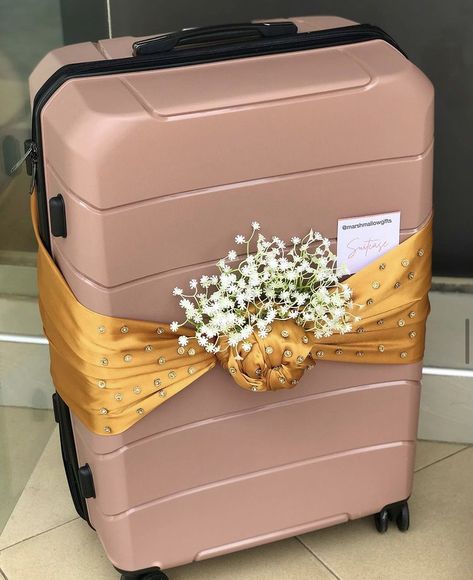 Suitcase wrapped in a gold satin for engagement dowry wrapping. Bridal Luggage Decoration, Suitcase Wrapping Ideas, Luggage Gift Wrapping Ideas, Suitcase Packing For Wedding, Wedding Suitcase Packing, Bridal Suitcase Packing, Wedding Suitcase Decor, Luggage Decorating Ideas, Suitcase Decoration Wedding