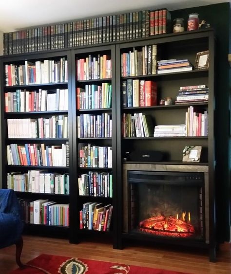 Materials: Two full-size and one narrow Hemnes bookshelves I had a spare wall in my living room, but wanted both a lot of book storage and a fireplace. I checked the dimensions of the Hemnes bookshelf, and discovered an electric fireplace insert that fit with just a little extra space. I used this AKDY 28 inch … Bookshelves Around Fireplace, Small Electric Fireplace, Hemnes Bookcase, Fireplace Bookcase, Library Fireplace, Billy Ikea, Billy Regal, Guest Bedroom Remodel, Fireplace Bookshelves