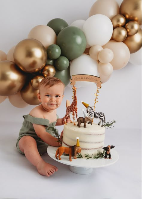 Alt=“baby boys first birthday cake smash eating cake of spoon wearing green romper”> 1st Birthday Photoshoot Wild One, Animal Cake 1st Birthday, Cake Smash Safari Theme, Safari One Year Old Birthday Photoshoot, Jungle Safari First Birthday, Neutral Jungle Birthday Party, Safari 1st Birthday Photoshoot, Natural Cake Smash, Wild One Cake Smash Photo Shoot