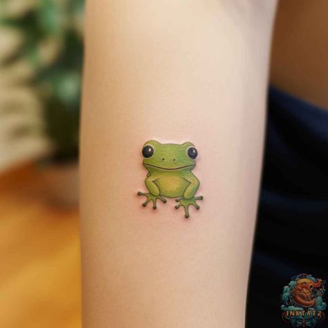 Unleashing the Symbolism: The Fascinating World of Frog Tattoos: 76 Designs - inktat2.com Small Cute Frog Tattoo, Green Tree Frog Tattoo, Tattoo Frog Cute, Aesthetic Frog Tattoo, Colorful Frog Tattoo, Small Frog Tattoo Simple, Frog Tattoos Simple, Green Frog Tattoo, Green Tattoo Ideas