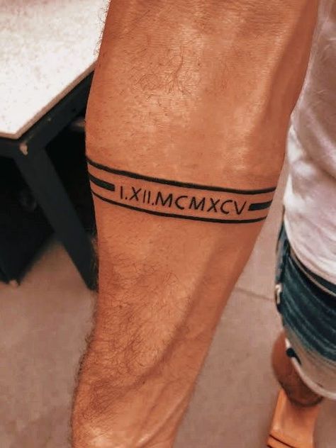 Simple Band Tattoos For Men, Forearm Tattoo Bands For Men, Roman Numeral Band Tattoo, Stripe Tattoo Arm Men, Tattoo Ideas For Men Arm Simple, Forearm Tattoo Band, Meaningful Armband Tattoos For Men, Bicep Band Tattoo Men, Men Forearm Tattoos Simple