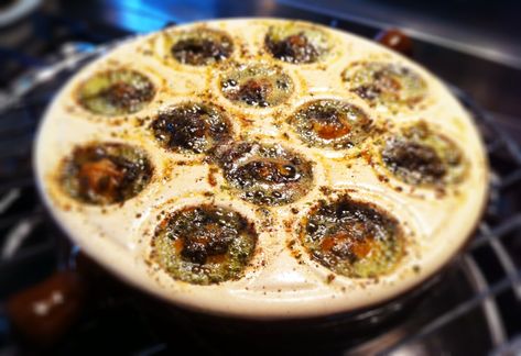 Vegetarian escargot bathing in a cauldron of butter, parsley and garlic Etiquette Dinner, Winter Feast, Parsley Butter, Grub Hub, Sides And Appetizers, American Club, Garlic Recipe, Vegan Sushi, Thanksgiving 2020