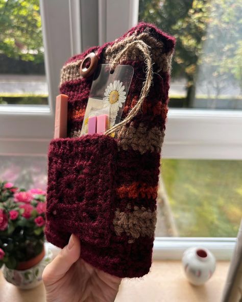 Our handmade Autumn BookSleeve with a pocket for all of your bookish stationary! Available on Etsy!! 🍁📚 • • • • • • #AutumnReads #HandmadeWithLove #BookSleeve #CozyVibes #BookishEssentials #CrochetLove #StationeryAddict #FallVibes #LimitedEdition #BookLover #BookAccessories #CozyUpWithBooks #themysticnook Booksleeve Crochet, Bookish Crochet, Fairy Trinkets, Crochet Book Bag, Crochet Organization, Crochet Organizer, Crochet Business, Bookish Things, Crochet Inspo