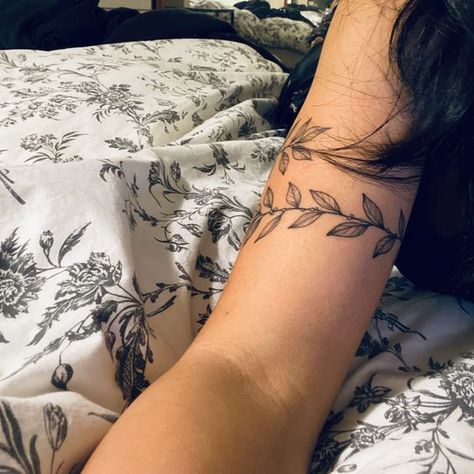 Upper Arm Tattoos For Women Wrap Around, Wrap Around Arm Tattoo For Women Simple, Wrap Around Mid Arm Tattoo, Upper Arm Leaves Tattoo, Cuff Tattoo Upper Arm, Vine Wrap Around Tattoo Upper Arm, Feminine Wrap Around Arm Tattoos, Upper Arm Woman Tattoo, Ivy Arm Band Tattoo