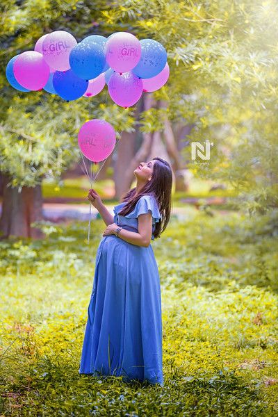 Gorgeous mom-to-be with balloons in her hand in the garden. Creative maternity portraits for the gorgeous mom-t0-be. Contact us now for pricing and packages. Indian Maternity Photos, Indian Maternity, Baby Bump Photoshoot, Maternity Dresses Photography, Maternity Photography Poses Outdoors, Maternity Photography Poses Couple, Pregnancy Photos Couples, Maternity Photography Poses Pregnancy Pics, Couple Pregnancy Photoshoot