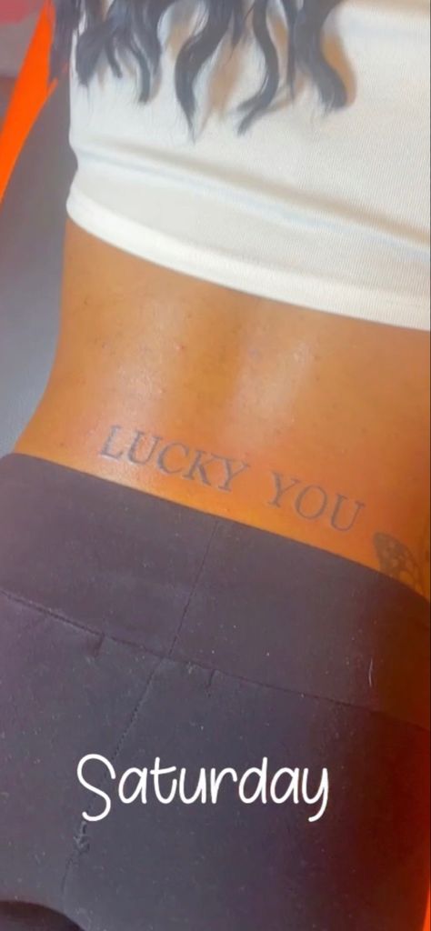 Lucky You Back Tattoo, Lucky You Tattoo Lower Back, Trap Stamp Tattoos Black Women, Trap Stamps Tattoo, Low Back Tattoo Women Ideas, Trap Stamp Tattoos Lower Backs, Back Dimple Tattoo, Lucky You Tattoo, Trap Stamp Tattoos