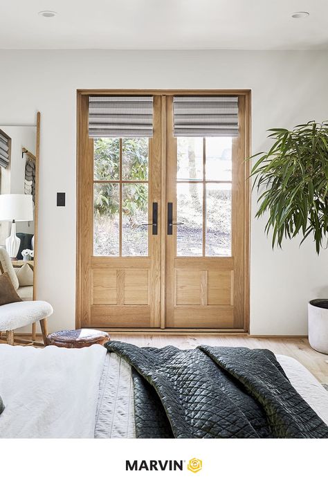 Emily Henderson used Marvin windows and doors to bring natural light into this space. These white oak doors balance out the neutral colors to achieve a soft yet subtly moody guest suite.  

📷: Sara Tramp for EHD. Marvin Windows, Blackout Shades, Hunter Douglas, Emily Henderson, Dining Nook, Guest Bed, Wood Ceilings, Mountain Home, Guest Bath