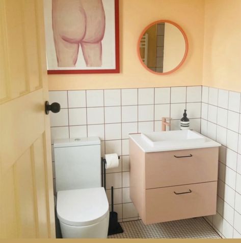 Mustard And Pink Bathroom, Best Colours For Bathroom, Peach And White Bathroom, Peach Colour Bathroom, Yellow Tiled Bathrooms, Bathroom Pop Of Color, Small Colourful Bathroom, Peach Toilet, Tile Paint Bathroom