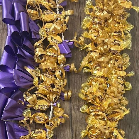 Make It Megan on Instagram: "✨New tutorial! Graduation season is here 🎓. Our new Youtube tutorial shows how to make 3 leis using hard candy 🍬 It is linked in our bio or check it out on our Youtube channel - Make It Megan 🌺♥️⁣ ⁣ ⁣ ⁣ ⁣ ⁣ ⁣ ⁣ ⁣ ⁣ ⁣ #candylei #graduationlei #graduationleis #candyleis #ribbonlei #ribbonleis #moneyleis #hawaiianleis #graduation2023" Candy Leis For Graduation, Graduation Candy Lei, Candy Lei, Graduation Candy, Ribbon Lei, Graduation Leis, Hawaiian Lei, Jolly Rancher, Hard Candy