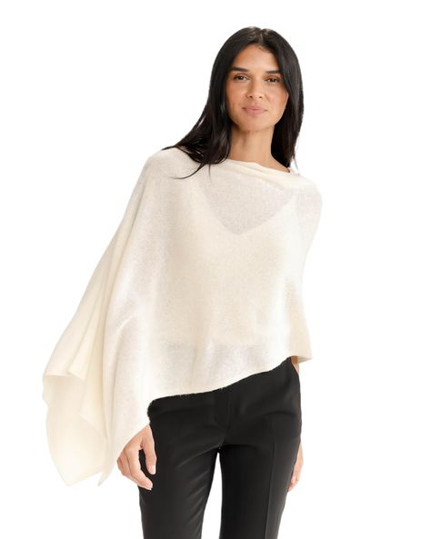 PRICES MAY VARY. Ultimate Luxury: Indulge in ultimate luxury with our large cashmere poncho wraps for women. Made from 100% super fine Inner Mongolian cashmere, this soft and warm garment is the perfect gift for anyone who loves the finer things in life. With a versatile design that covers your arms , this poncho is similar to ruanas and better than Shawl, elevating the look and style of any outfit. Rainbow of Colors: The poncho is available in a rainbow of colors, with over 60 shades to choose Poncho Shawl Outfit, Scandinavian Shawl, Note Highlighting, Cashmere Poncho Outfit, Shawl Outfits, Poncho Outfit Fall, Chiffon Poncho, Poncho Fashion, Luxe Dress