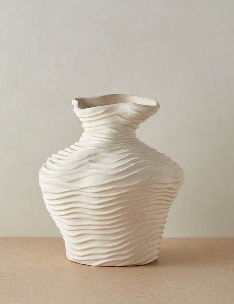 The Wrinkle Vase brings fresh sophistication to any space. Flowing lines fold into a beautifully organic earthen form full of textural intrigue—with natural variations in the glaze offering a unique finish to each piece. We love this vase for bringing a sculptural edge to fresh-cut or dried botanical arrangements. This piece is from our exclusive Sarah Sherman Samuel collaboration and features all the trademarks of her warm, edited style. Sculptural Pottery, Soft Architecture, Brand Examples, Organic Pottery, Vase Aesthetic, Botanical Arrangements, Unusual Vases, Burled Wood Furniture, Youtube Background