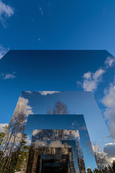 Gregory Orekhov’s Black Square installation offers a new perspective on Moscow’s Malevich Park thanks to its dizzying mirrored corridor. Seen from the front, the artwork is a simple pair of black monoliths – but once passersby step inside they can enjoy a mind-bending view from between two huge mirrors. Photography: Ivan Muraenko #installation #art #mirror #design #architecture #moscow Moscow Art, Huge Mirror, Kazimir Malevich, Mirror Installation, Avant Garde Artists, Saatchi Gallery, Countryside Landscape, Mirror Art, Built Environment