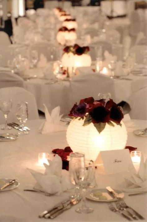 paper lantern centerpiece via @Remodelaholic Something Borrowed Wedding, Lanterns With Flowers, Cheap Wedding Decorations, Lantern Centerpieces, Unique Wedding Flowers, Wedding Reception Centerpieces, Wedding Floral Centerpieces, Reception Centerpieces, Inexpensive Wedding