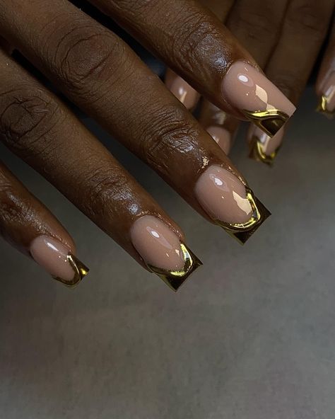 Stunning and show-stopping. A set to look and smile at always 🌟🌟 #nails #goldnails #goldchromenails #nailsinikeja #nailinspo #ogbanails #nailsaloninberger #excellencehotelogbalagos #squarenails #explore #nailsoflagos New Years Nail Designs Glitter Square, Black Tip Nails With Gold, Simple Nail Designs Gold, Black And Gold Nails Short Square, Minimal Gold Nails, New Years Square Nails, Short Square Acrylic Nails Gold, Gold Nails Acrylic Short, Square Gold Nails