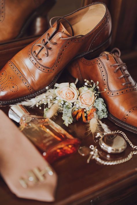 Brown brogue wedding shoes beside pastel peach rose buttonhole and silver pocket watch Grooms Accessories, Wedding Accessories Photography, Fall Groom, Wedding Photography Detail Shots, Groom Wedding Shoes, Groomsmen Wedding Photos, Rose Buttonhole, Vera Wang Wedding Dress, Vera Wang Bridal