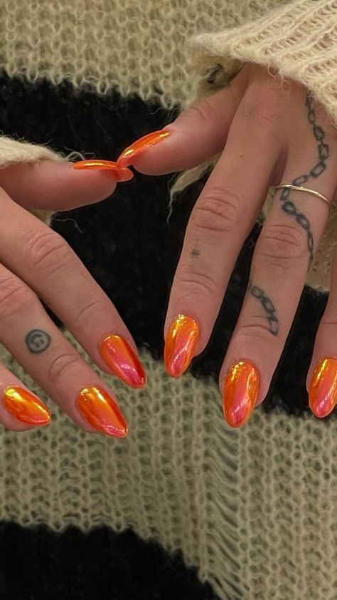 A set of hands showing stiletto-shaped nails painted in a glossy, vibrant orange shade. Orange Nail, Bold Nail Art, Orange Nail Ideas, Nail Ideas For Summer, Neon Orange Nails, Mens Nails, Tropical Nails, Summery Nails, Cute Acrylic Nail Designs