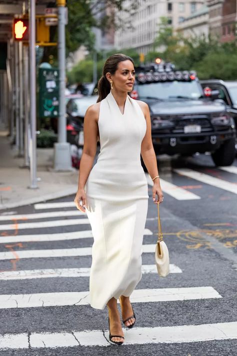 Nada Adelle in a sleeveless white gown with a white a gold bag White Bag Outfit, Nada Adelle, Sleeveless Top Outfit, Wedding Reception Outfit, First Dance Photos, Reception Outfits, Reception Outfit, Modest Casual Outfits, Second Wedding