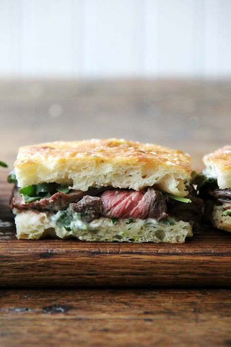 In these skirt steak sandwiches, skirt steak is layered with arugula between slices of focaccia smeared with herbed mayonnaise. Alexandra Cooks, Samin Nosrat, Skirt Steak Recipes, Steak Sandwiches, Brunch Buffet, Steak Sandwich, Sandwiches And Wraps, Skirt Steak, Burgers Sandwiches