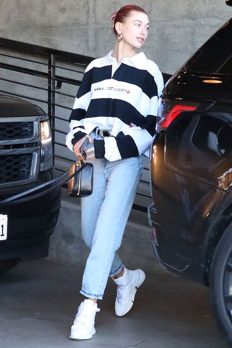 Hailey Baldwin’s Street Style: Backless Top, Futuristic Sneakers – Footwear News Polo Shirt Outfit Women's Street Style, Polo Street Style, Polo Top Outfit, Polo Dress Outfit, Futuristic Sneakers, Alexander Wang Top, Polo Shirt Outfits, Polo Outfit, Rugby Fashion